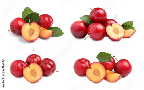 Set with delicious ripe cherry plums on white background
