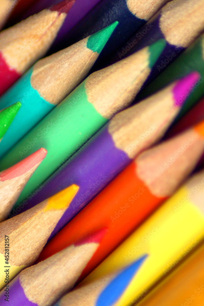 multi-colored pencils with a sharpened lead take up all the space