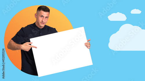Young man shows poster. Man...
