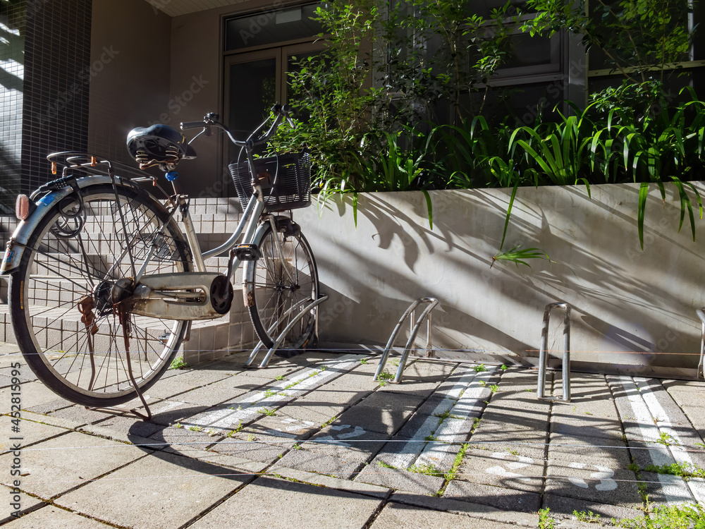 Sunny view of a old bicycle with shadows Sunny view of a old bicycle with shadows