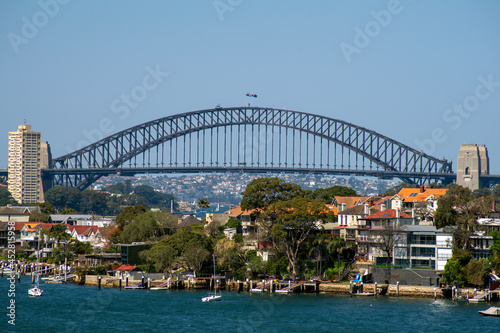 View of Sydney Harbour Bridge with residential suburb in foreground, Sydney, NSW, Australia