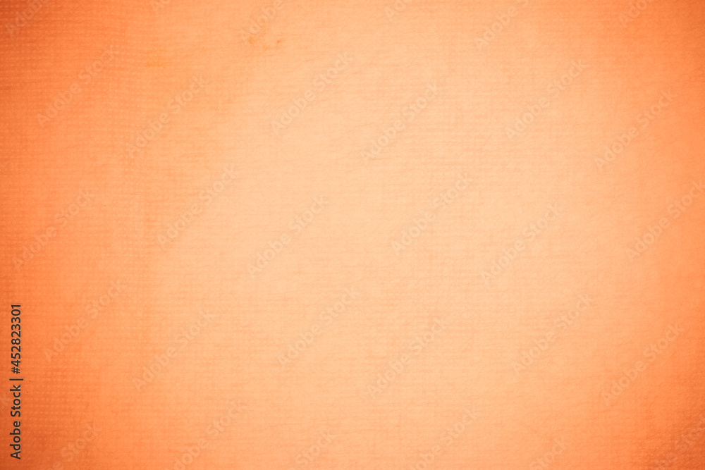 Fototapeta premium Textured recycling paper orange background.
