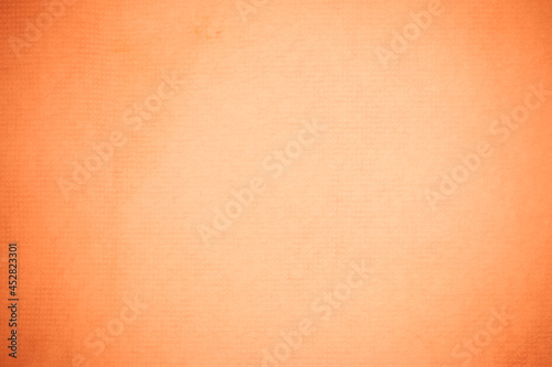 Textured recycling paper orange background.