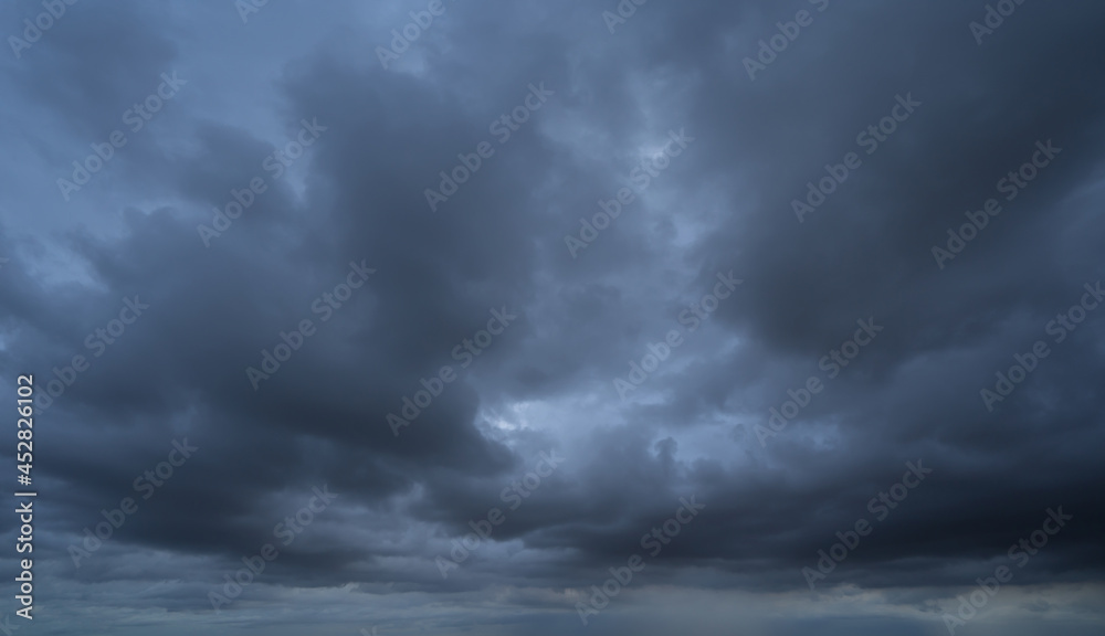 Dramatic dark clouds sky with thunder storm and rain. Abstract nature landscape background. - obrazy, fototapety, plakaty 