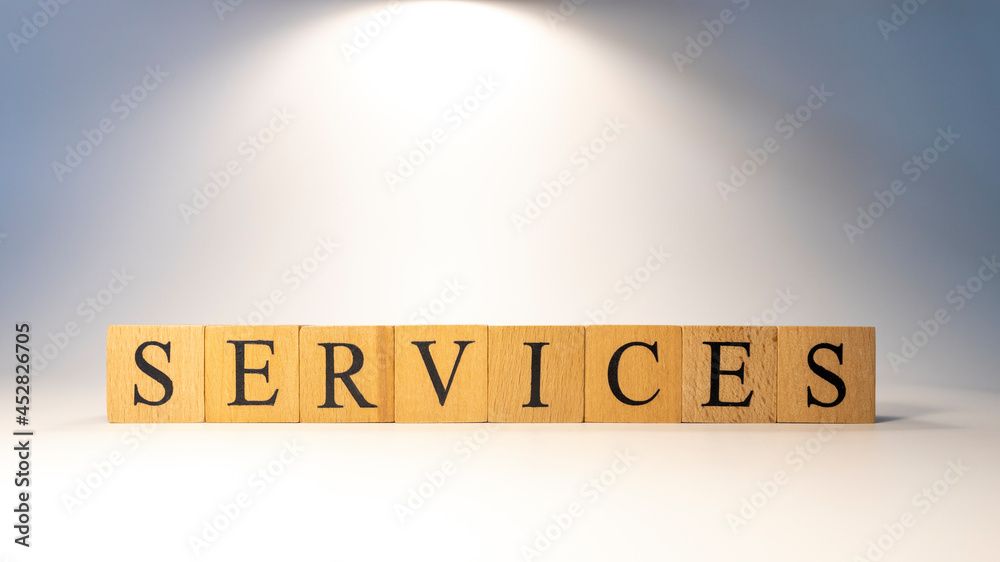 The word Services was crafted from wooden cubes.finance and business. The word Services was crafted from wooden cubes.finance and business.