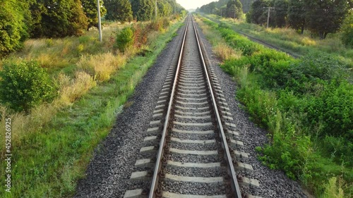 Railway lines through the forest and nature photo