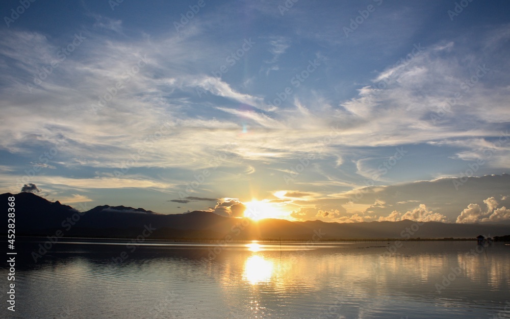 sunset over the lake sunset over the lake