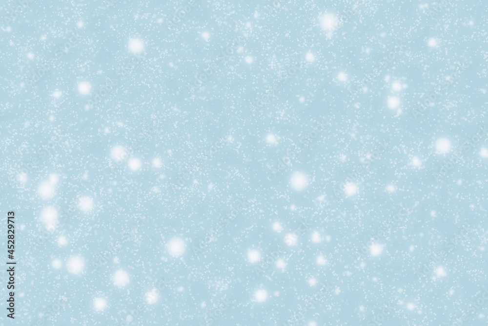 Abstract blue and white snowflakes and snowfalls background.  Photo can be used for Christmas, New Year, Winter season and all celebration backgrounds.  