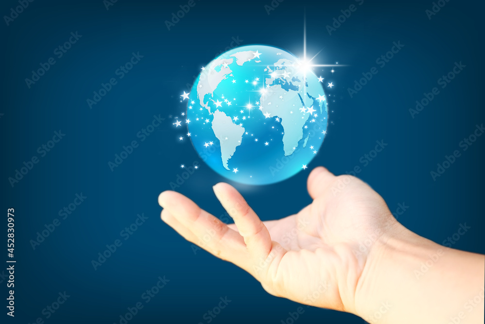 Business hand holding earth globe on blue background, Global connection and data exchanges, global communication concept Business hand holding earth globe on blue background, Global connection and data exchanges, global communication concept