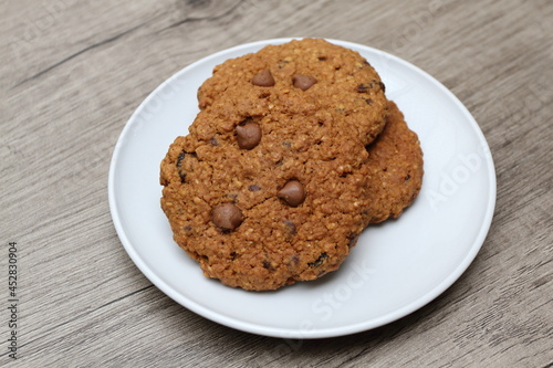 Delicious brown sugar oatmeal cookies on white plate