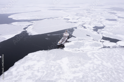 The sea vessel is among the ice.