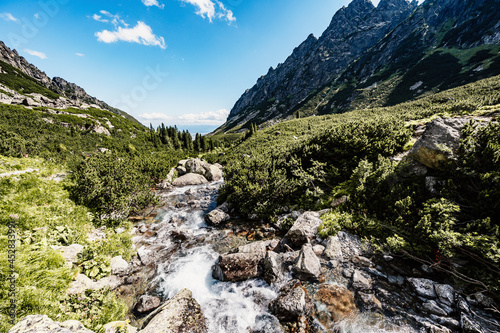 Hiking the Great Cold Valley/ velka studena dolina/ to Zbojnicka cottage and teryho cottage through priecne saddle. High Tatras National park , Slovakia landscape photo