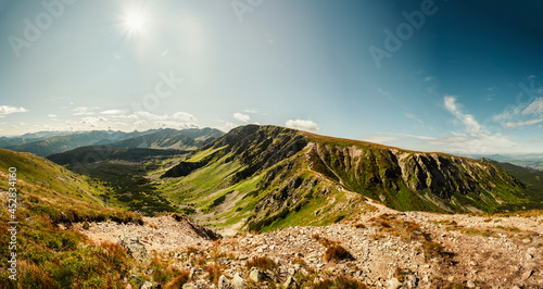 Hiking to salatin and brestova peak from zuberec. Western Tatras mountains, Rohace Slovakia. Hiker with backpack rises to the mountains. Slovakia mountains landscape. Panorama photo