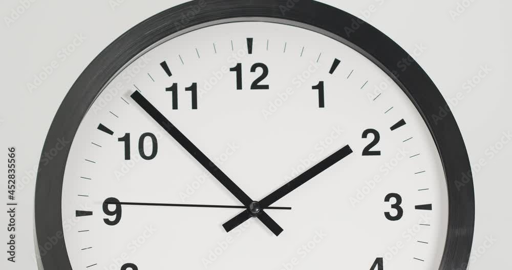 Close-up detail Zoom in, Black Wall clock isolated on white background Startime 01.53 am second-hand minute Walk. Close-up detail Zoom in, Black Wall clock isolated on white background Startime 01.53 am second-hand minute Walk.