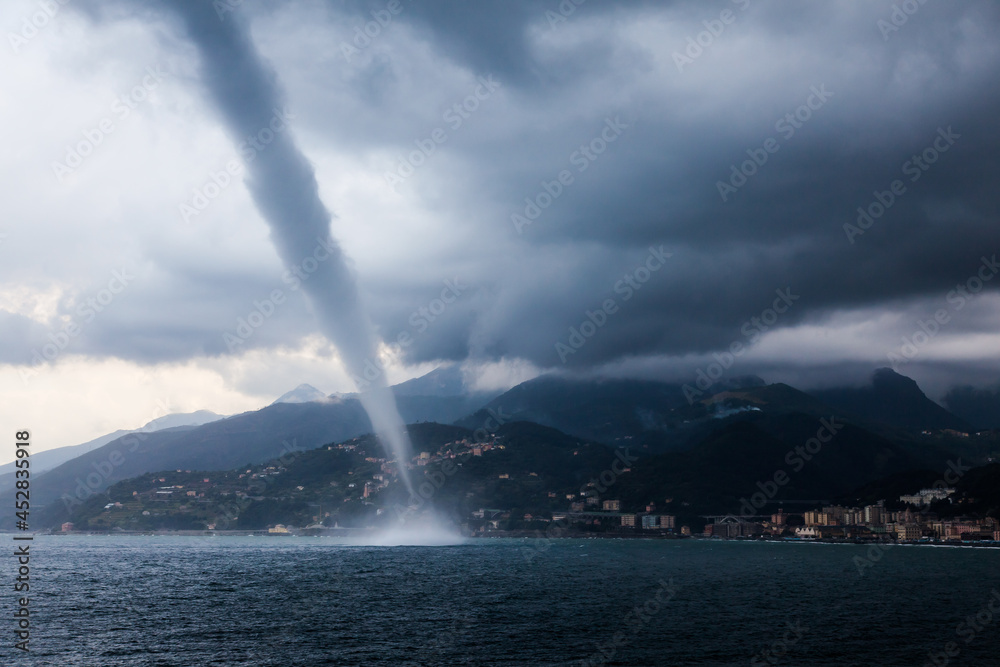 Fotografie, Obraz Tornado in the sea near the shore