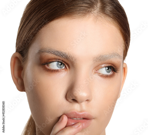 Beautiful young woman with ...
