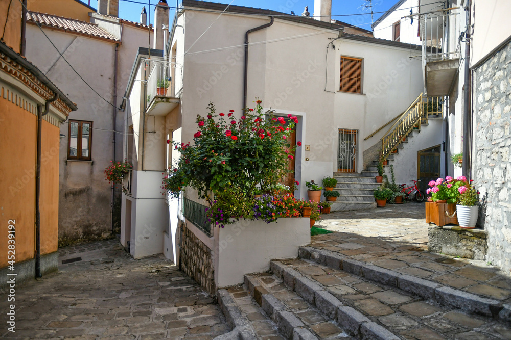 A street in the historic center of Castelsaraceno, a old town in the Basilicata region, Italy. A street in the historic center of Castelsaraceno, a old town in the Basilicata region, Italy.