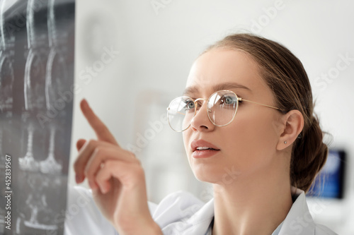 Female doctor with x-ray sc...