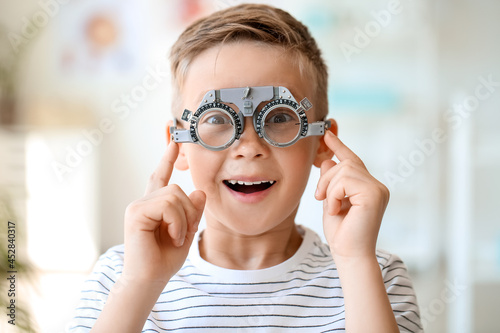 Little boy undergoing eye test in clinic