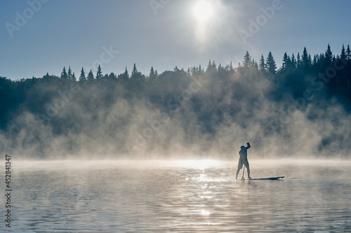 Photography Scenic paddle surfing in mountain river