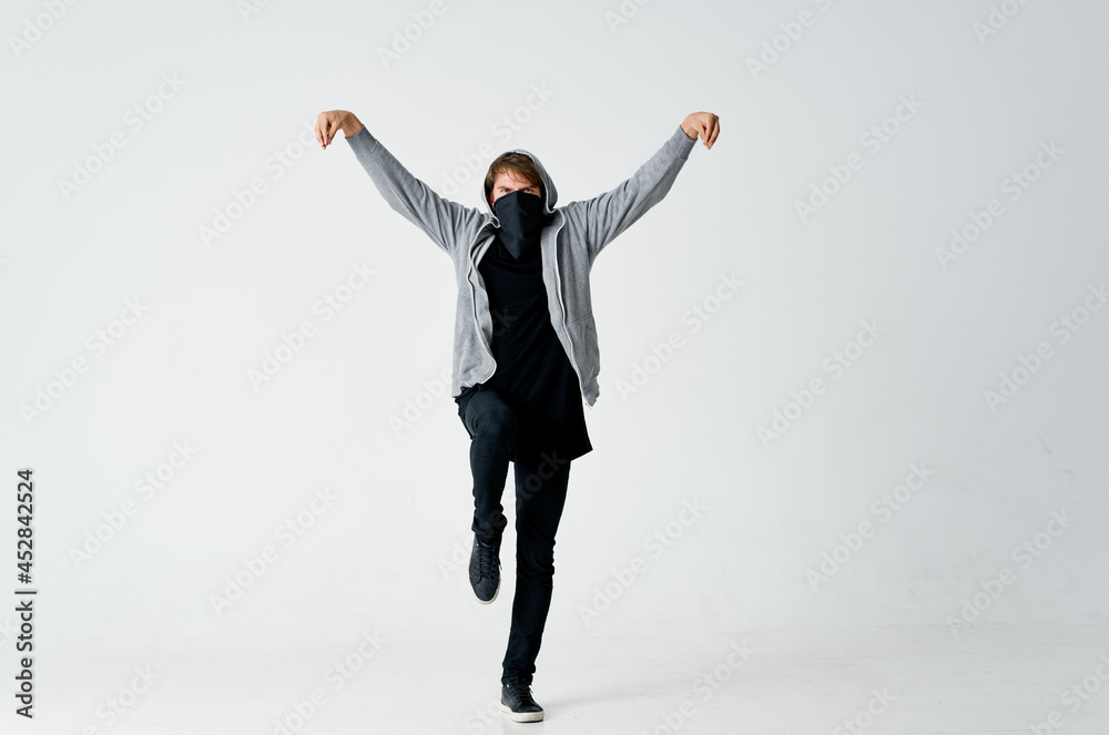 masked hooded man hiding his face stealing emotions anonymity masked hooded man hiding his face stealing emotions anonymity