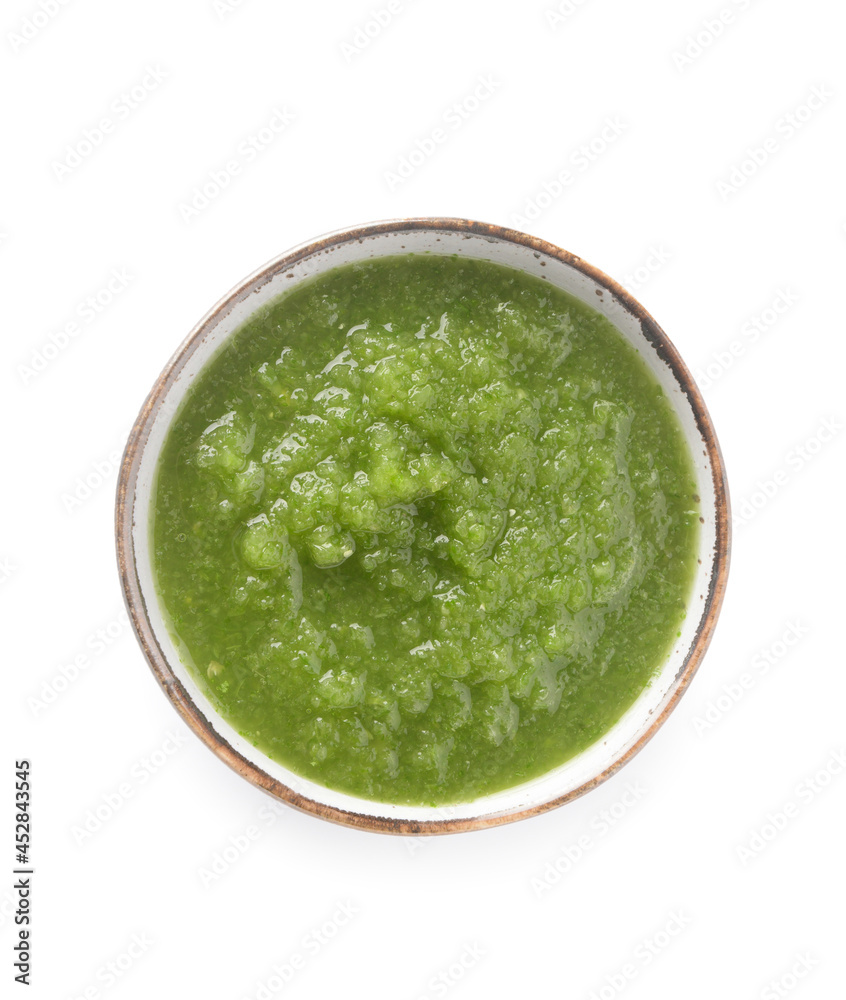 Bowl of Tomatillo Salsa Verde sauce on white background Bowl of Tomatillo Salsa Verde sauce on white background