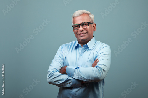 Portrait of a happy mature man of Indian ethnicity  © AJay