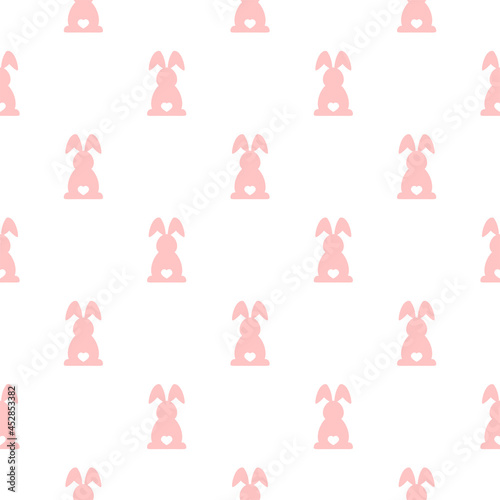 Seamless abstract pattern with Easter rabbits and hearts of different pastel colors.