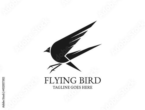 Flying bird silhouette for logo with bird identity