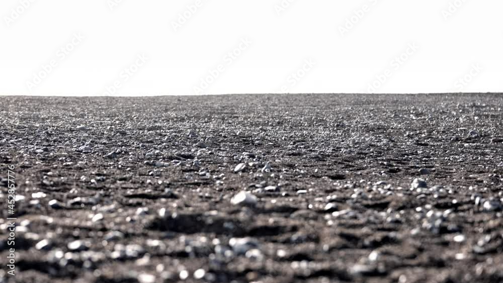 Endless Horizon of a Vast Rocky Field, and Bright Clear Sky in Background Endless Horizon of a Vast Rocky Field, and Bright Clear Sky in Background
