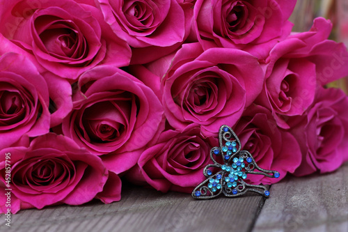 Pink Roses and Blue Butterfly Jewelry  Shallow DOF