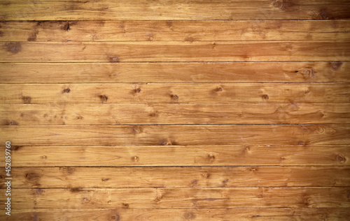 Dark brown plank wood wall texture in horizontal patterns for old background and space