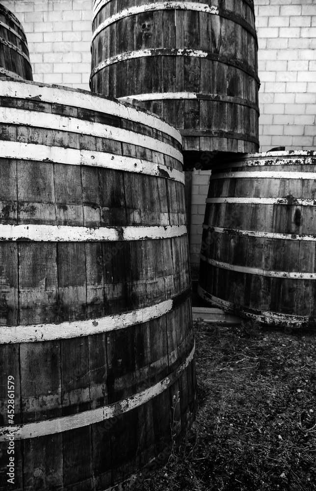 Old rusty wooden barrels