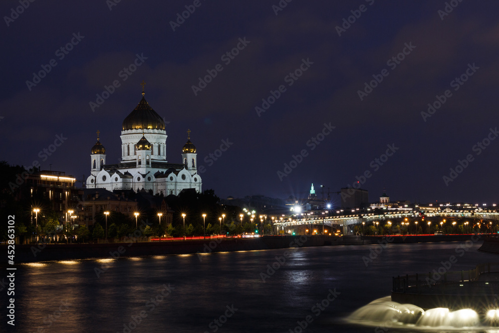 Moscow, Russia. Night view of Moscow river near Cathedral of Christ the Saviour. Patriarshy Bridge