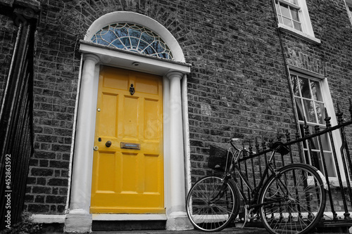 The door nearby - traditional entrance in Dublin, Ireland. The sign on the door says 