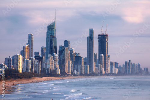 Gold Coast Cityscape and beach, cloudy skies at sunrise © Bostock