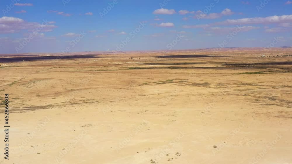 Aerial: Beautiful Shot Of Brown Desert Landscape On Sunny Day - Nitzana Hillocks, Israel Aerial: Beautiful Shot Of Brown Desert Landscape On Sunny Day - Nitzana Hillocks, Israel