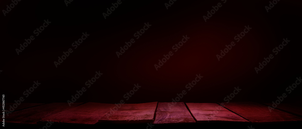 A rustic wood tabletop product display background with copy space and a spooky night red tint. - obrazy, fototapety, plakaty 