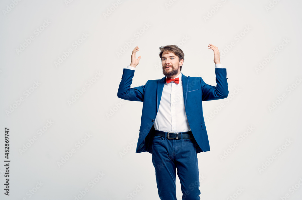 man in professional suit posing fashion manager light background man in professional suit posing fashion manager light background