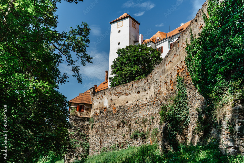 Bitov Castle on steep promontory towering above meandering River Zeletavka,near Vranov reservoir,Czech Republic.Popular Gothic chateau near Czech-Austrian border overlooks deep forest,gorgeous scenery