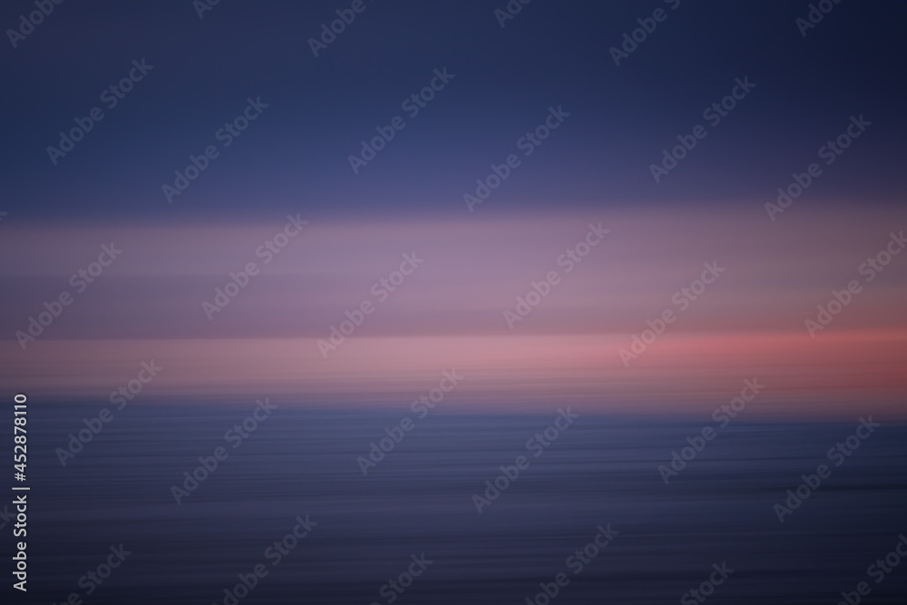 Abstract background cloudy sunset on sea