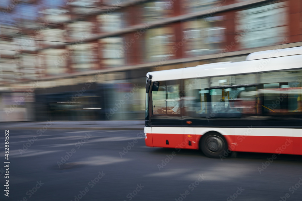 Bus of public transportation in blurred motion. Daily life in city. Prague, Czech Republic..