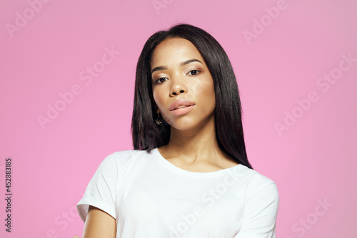 attractive african woman long hair makeup posing