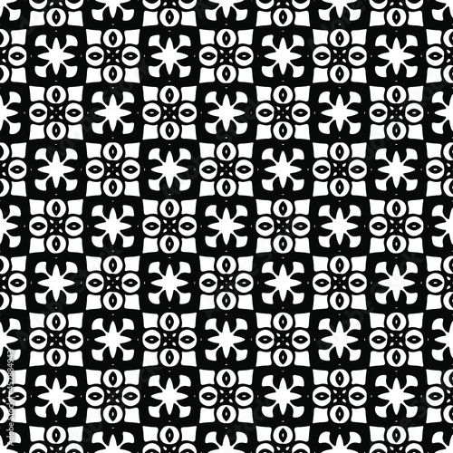 Flower geometric pattern. Seamless vector background. White and black ornament. Ornament for fabric, wallpaper, packaging.Decorative print 