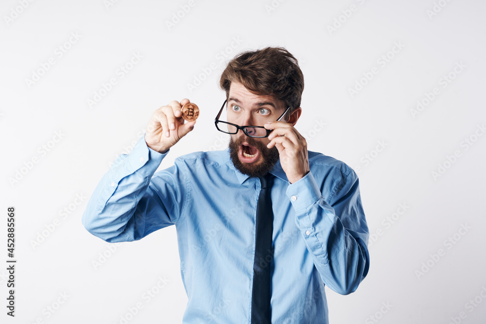 man in shirt with tie finance cryptocurrency bitcoin manager light background
