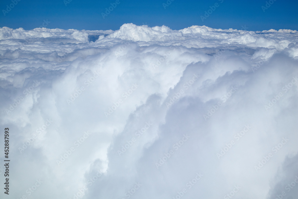 sky and clouds from the airplane window from above