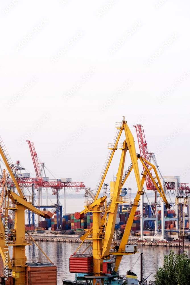 Trade Port. Shipping cargo to harbor. Water International Transport. International transportation. Container ship in export and import. Shipping cargo to harbor by crane. High quality photo