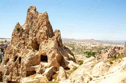 Beautiful rocks of Cappadocia against the blue sky. Goreme  Turkey. Travel concept