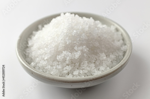 Salty white salt. Coarse salt. Salt grains