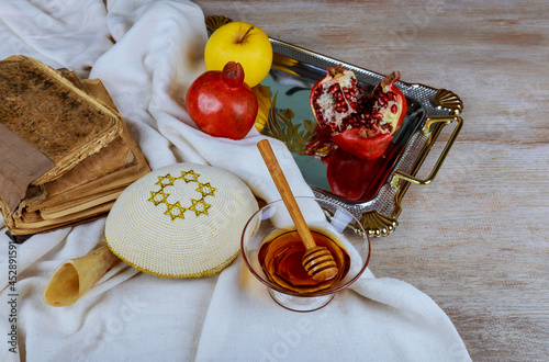 Jewish holiday Rosh Hashanah celebration on festive table photo